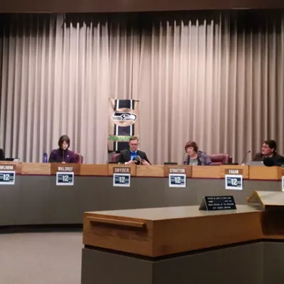 Image: City council is ready for some football (and some cute boys and fried chicken)