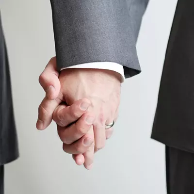 Image: State to convert same-sex domestic partnerships to marriages