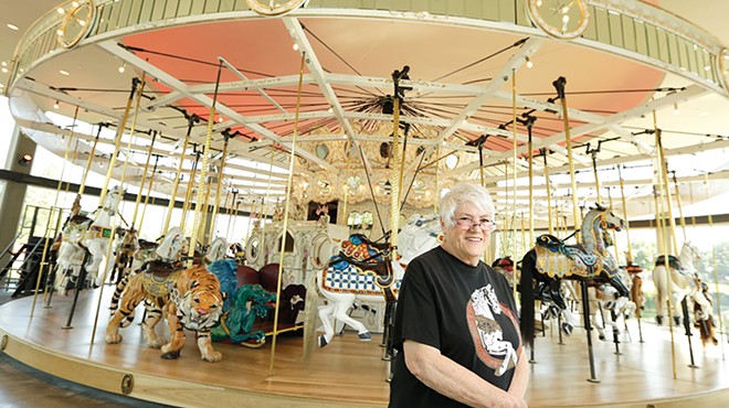 Bette Largent keeps the Looff Carrousel looking as sharp as it did more than 100 years ago