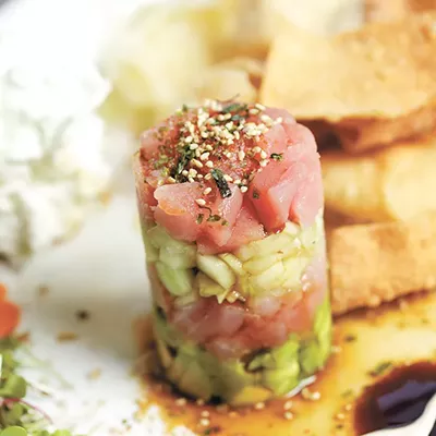 Image: Tall Order: 1898 Public House's Tyler Schwenk uses an unusual technique to plate his ahi poke tuna