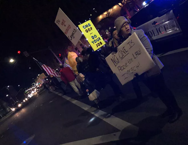 Image: Impeachment supporters gather in downtown Spokane on Tuesday night