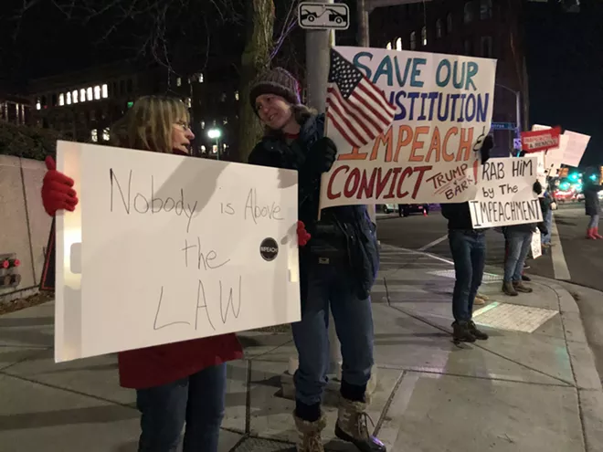 Image: Impeachment supporters gather in downtown Spokane on Tuesday night