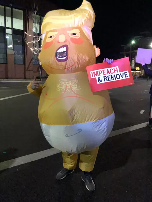 Image: Impeachment supporters gather in downtown Spokane on Tuesday night