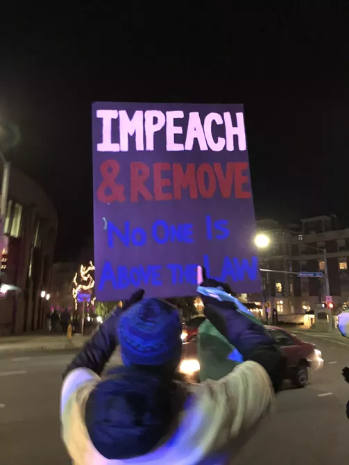 Image: Impeachment supporters gather in downtown Spokane on Tuesday night