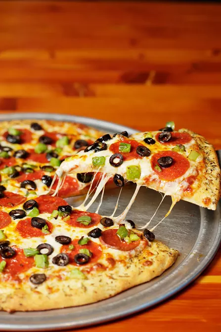 Image: Bask in the cheesy goodness that is the Inlander's pizza issue