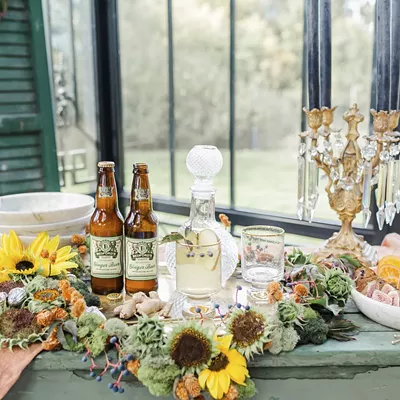 Image: A handcrafted sunflower wreath and DIY mocktails will set the mood for an autumn gathering