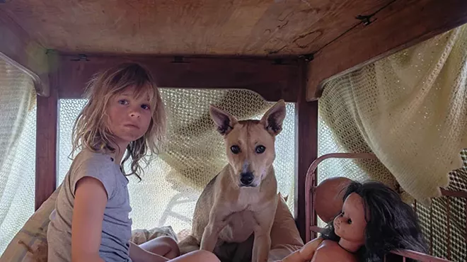 Image: A memoir of an African upbringing in turbulent times comes to life in Don't Let's Go to the Dogs Tonight