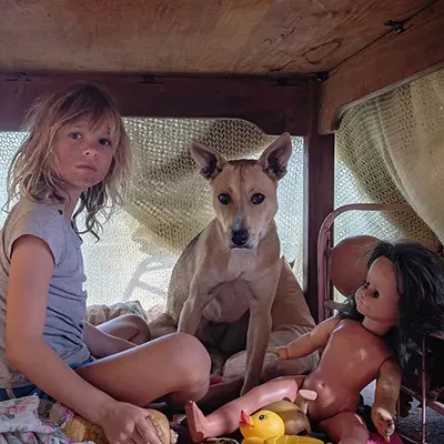 Image: A memoir of an African upbringing in turbulent times comes to life in Don't Let's Go to the Dogs Tonight