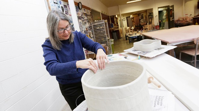 Before retiring from Eastern Washington University, ceramics instructor Lisa Nappa partakes in one last faculty art showcase