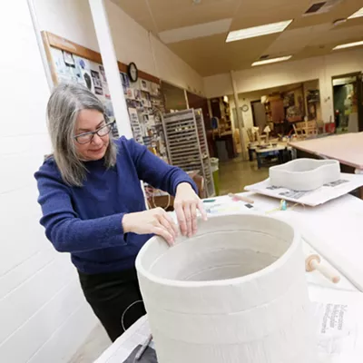 Image: Before retiring from EWU, ceramics instructor Lisa Nappa partakes in one last faculty art showcase