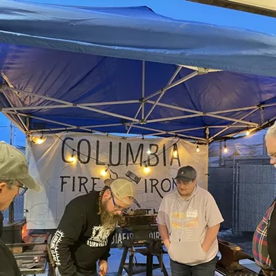 Image: CFI Member and Instructor Chris Kerney demos forging a steel candy cane ornament during CFI's 2023 Winter Conference