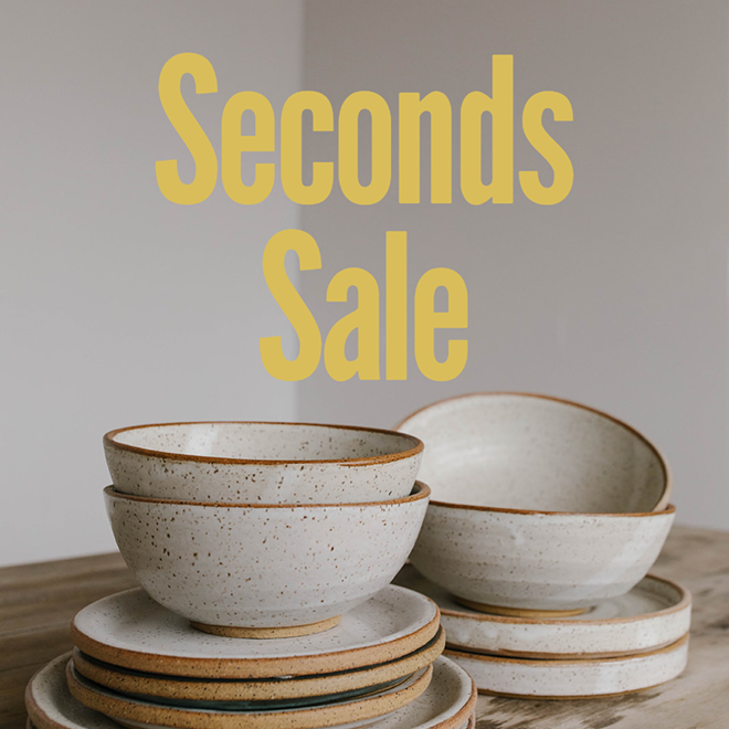 A stack of handmade ceramic dishes
