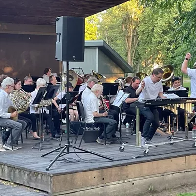 Image: Chris Wilson plays an xylophone solo with the Moscow Community Band in June 2023. A.J. Miller directs the band.