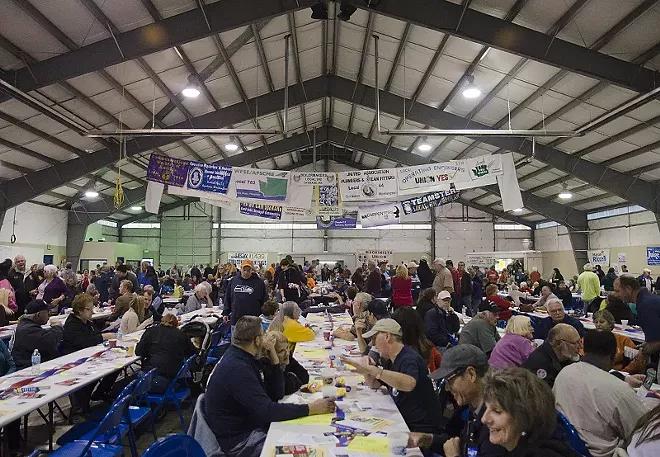 Regional candidates mingle with workers at annual labor rally