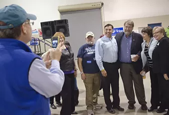 Regional candidates mingle with workers at annual labor rally