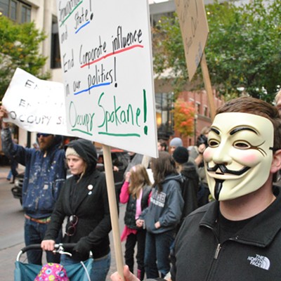 Occupy Spokane takes to the streets, goes to the bank