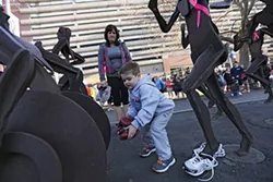 Photo Story: A Riverfront Park Tribute Run To Boston