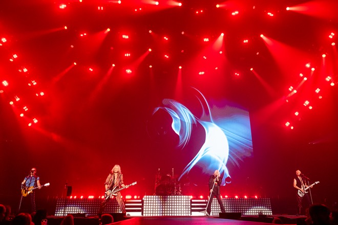 Photos of Def Leppard performing at the Spokane Arena on September 6, 2024