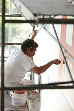 PHOTOS: Painting a logo mural at the new Inlander HQ