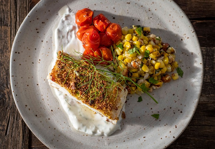 Image: Pistachio Halibut with Smoked Tomatoes and Corn Salad