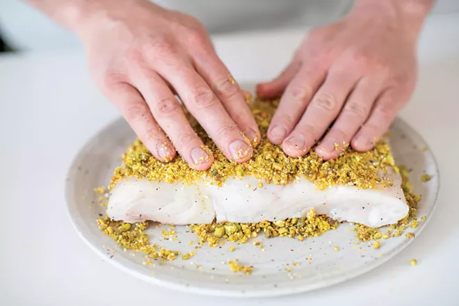 Image: Pistachio Halibut with Smoked Tomatoes and Corn Salad