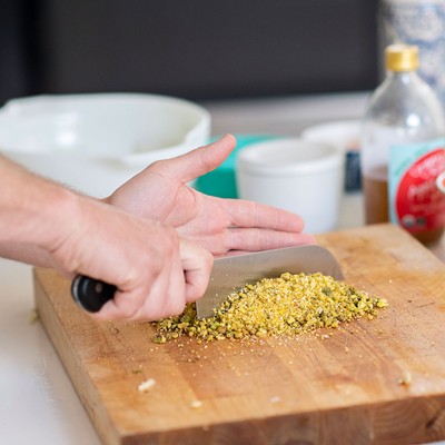 Image: Pistachio Halibut with Smoked Tomatoes and Corn Salad