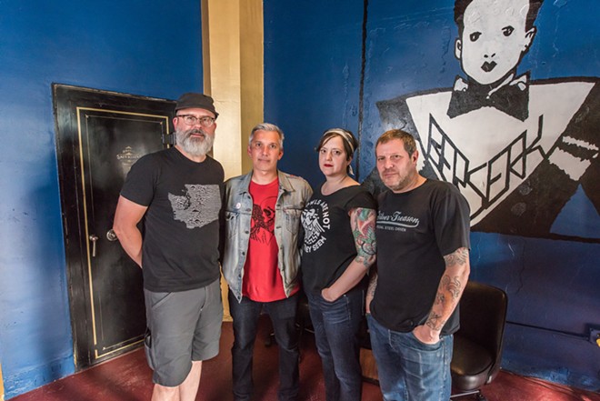With bright blue walls and open floor, Berserk bar brings art, rock and booze to downtown Spokane