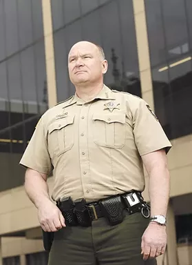 Dissecting the gun reforms that have sheriffs across Washington in open revolt and how the new law might fare in court