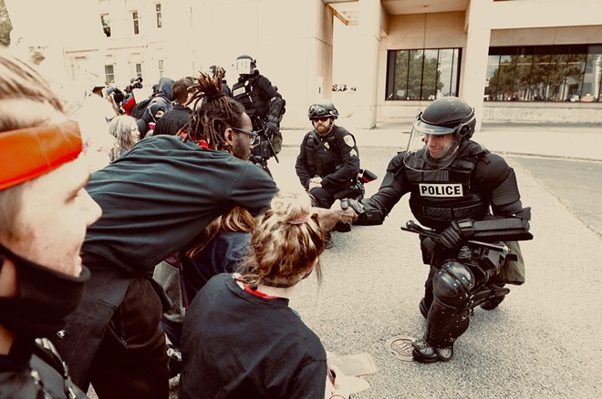 UPDATED: "This is not us": Spokane mayor orders curfew as police try to disperse crowd; officials ask governor for National Guard