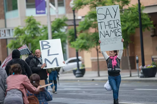 As thousands march for more police accountability, a proposed Spokane Police contract could result in less