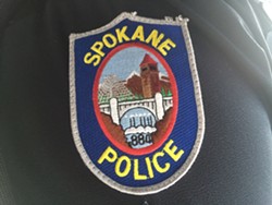 Spokane police shoot a man trying to break into cars on North Division