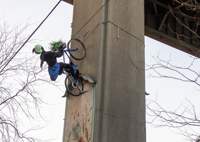 NEWS BRIEFS: A new mysterious bike hangs near the Spokane River