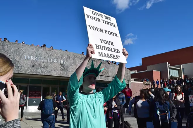'Trump Wall' at WSU is met by scores of protesters