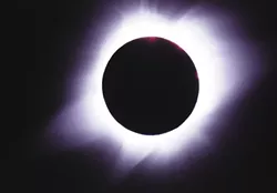 The moon upstages the sun, 10 sailors missing after U.S. Navy ship hits tanker, and morning headlines