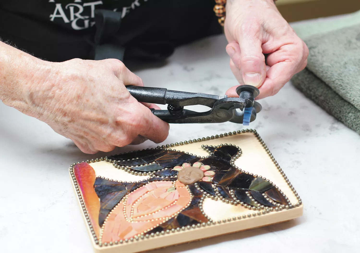 Kerry Whitsitt's whimsical, colorful mosaics combine her interest in