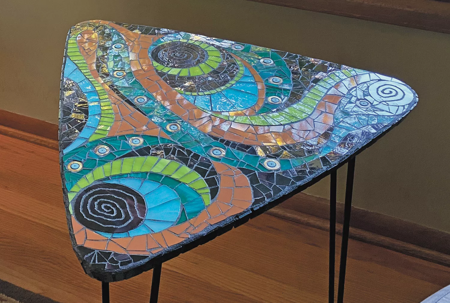 Kerry Whitsitt's whimsical, colorful mosaics combine her interest in