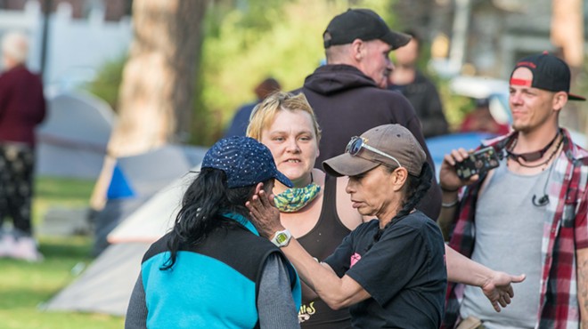'We obviously have a Camp Hope 2.0-type situation': photos from Thursday night's homeless camp police confrontation